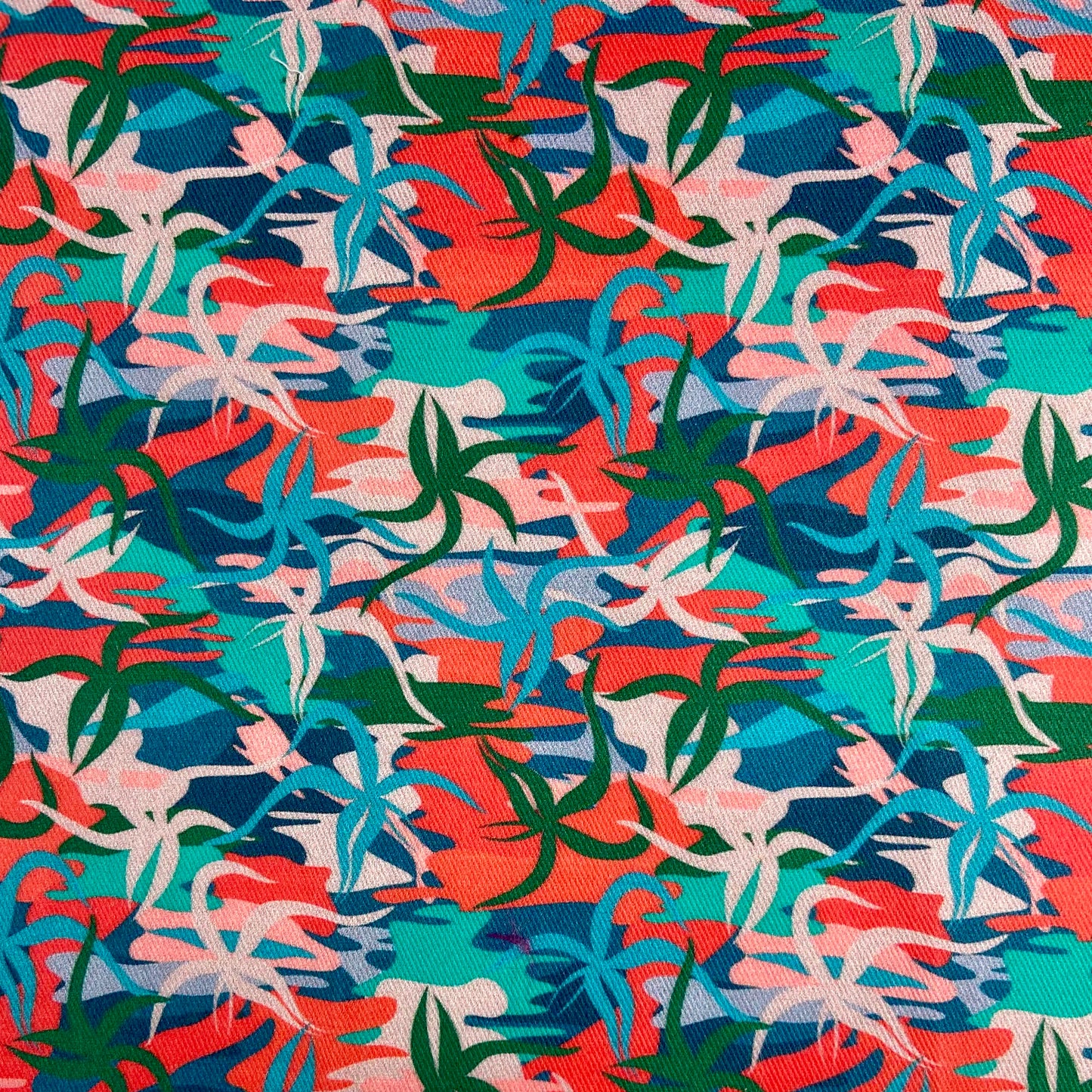 Sergé de coton imprimé motif jungle plantes tiges aloe vera lianes couleurs vives turquoise vert bleu corail orange rose saumon multicolore 